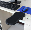 Black rotatable plastic wrist pad with 180-degree hand bracket, 290mm size, on a desk with a keyboard and mouse