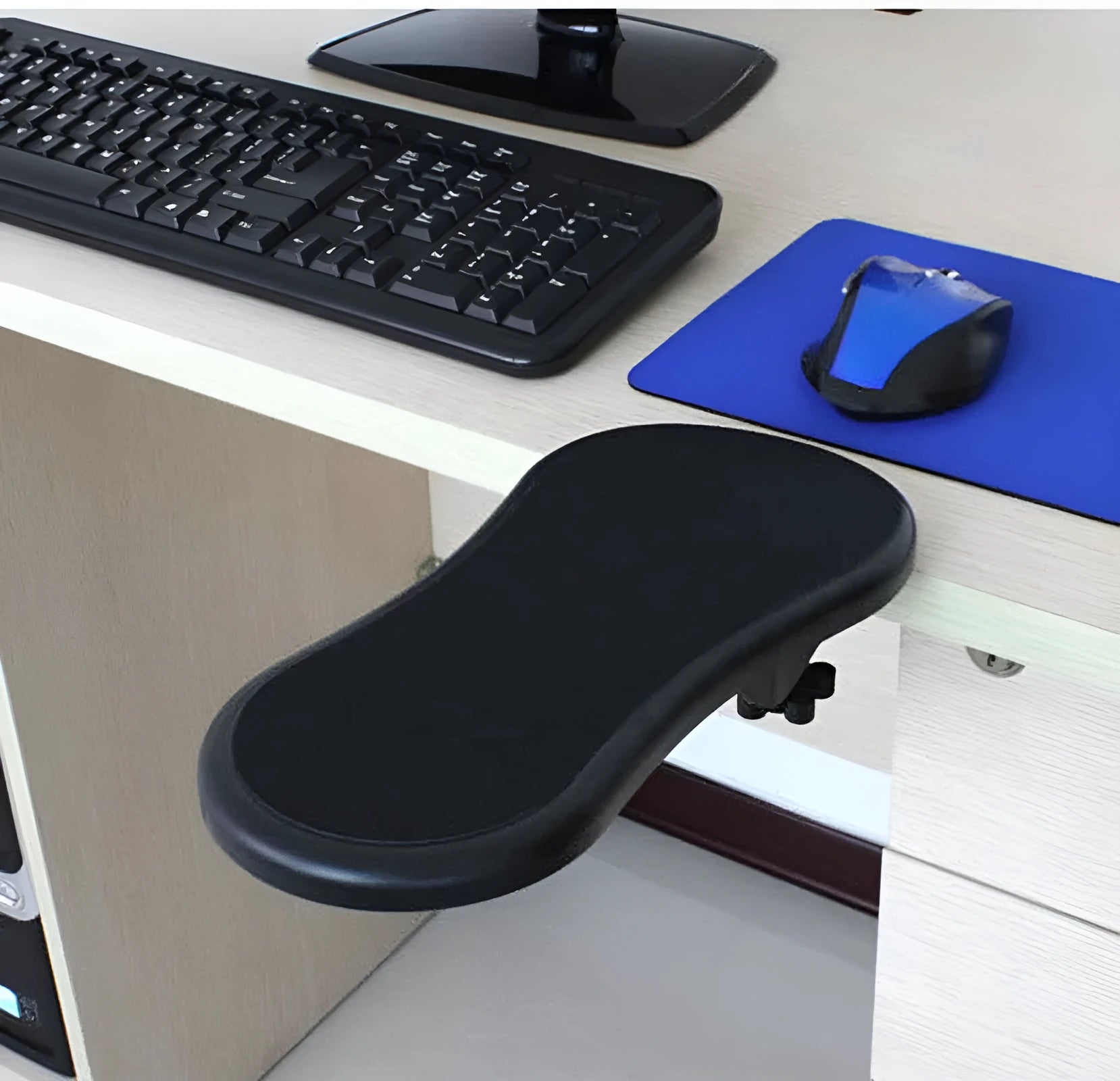 Black rotatable plastic wrist pad with 180-degree hand bracket, 290mm size, on a desk with a keyboard and mouse