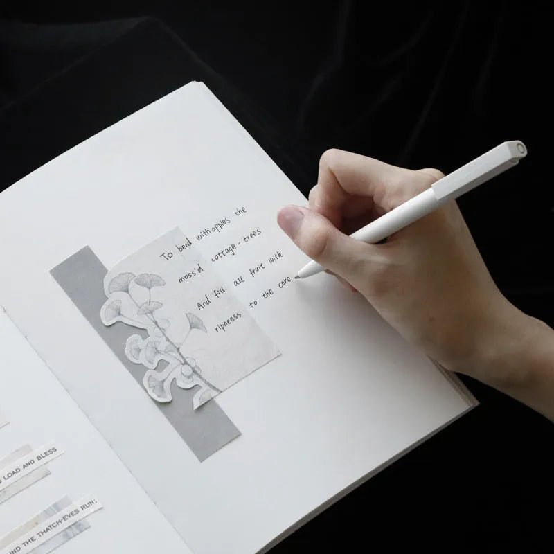 Soft imitation leather notebook with bronzing details, A5 size, red colour, showing dot matrix page interior