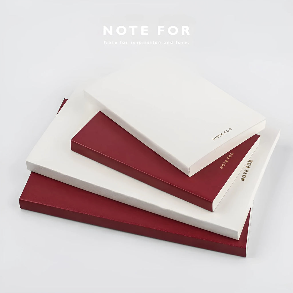 Soft imitation leather notebook with bronzing details, A5 size, red colour, showing dot matrix page interior