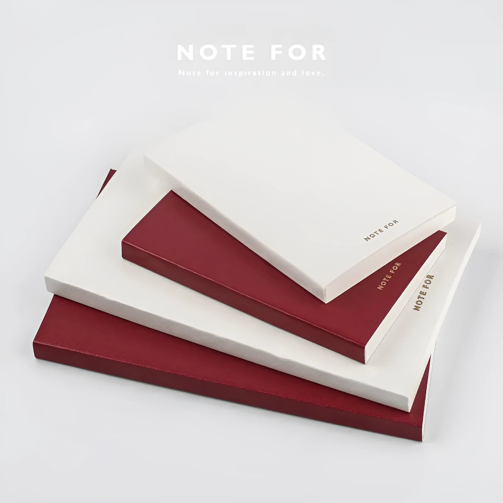 Soft imitation leather notebook with bronzing details, A5 size, red colour, showing dot matrix page interior