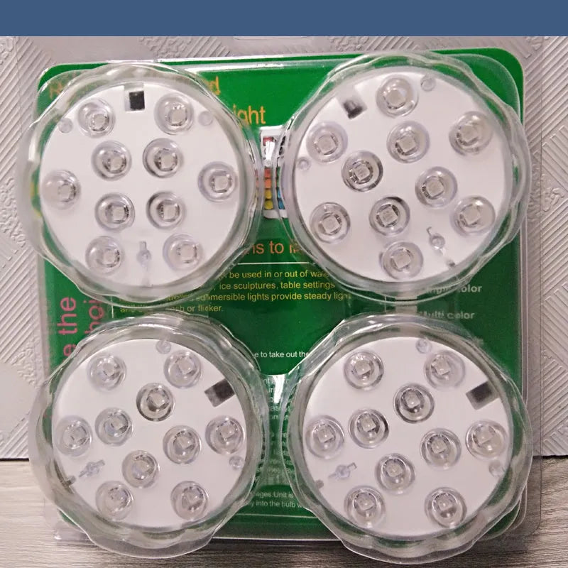White round waterproof LED light with remote control for pools and ponds.