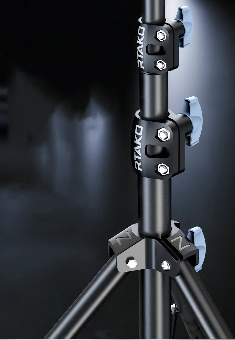 Carbon steel mobile phone tripod with attached light ring, shown at different heights for iPhone content creation