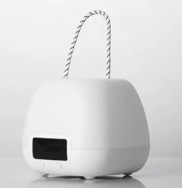 White rechargeable night light for breastfeeding with remote control, projection function, and USB charging for bedside use