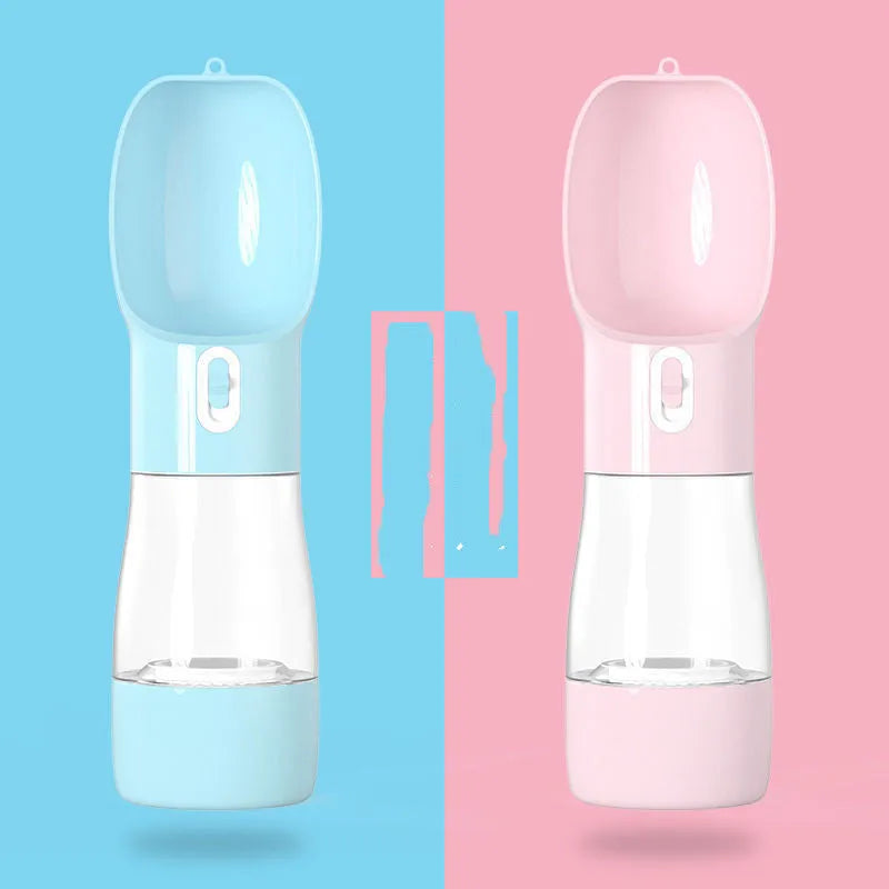 Portable pet bottle dog waterer in blue with one-hand squeeze design on table