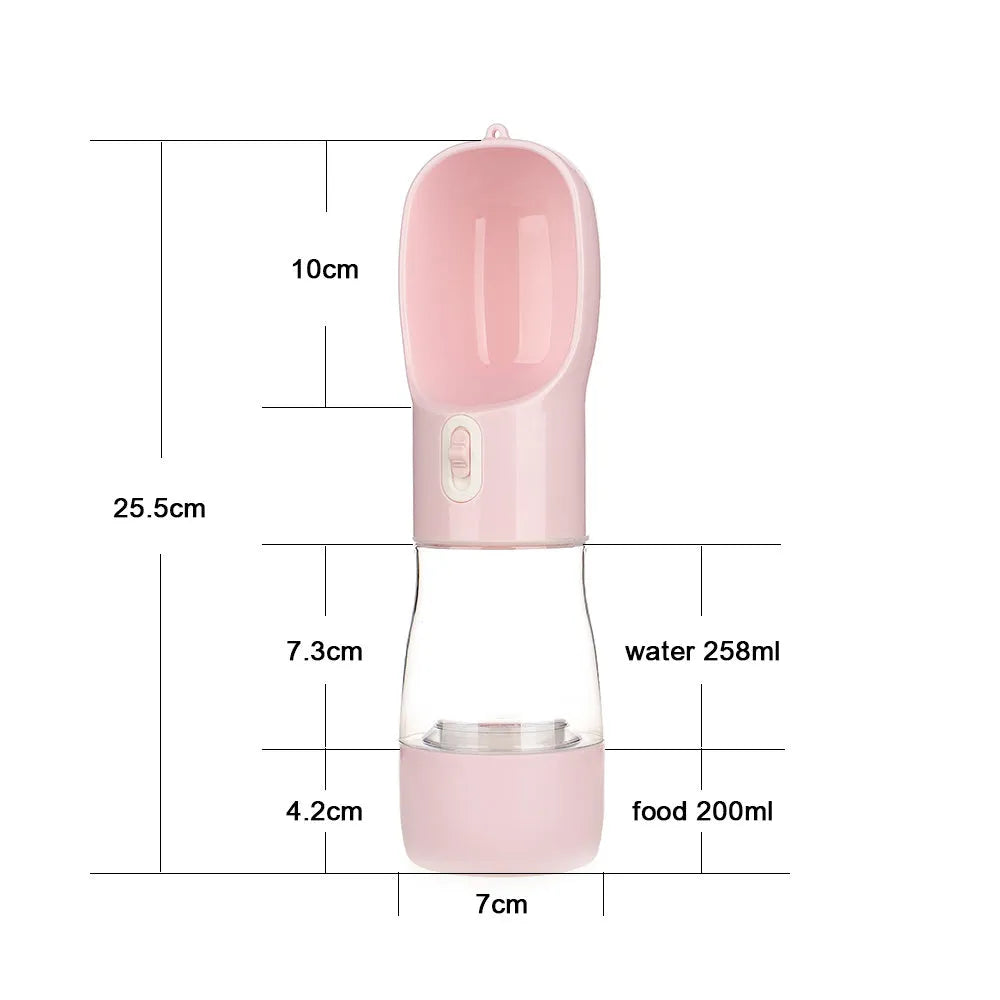 Portable pet bottle dog waterer in blue with one-hand squeeze design on table