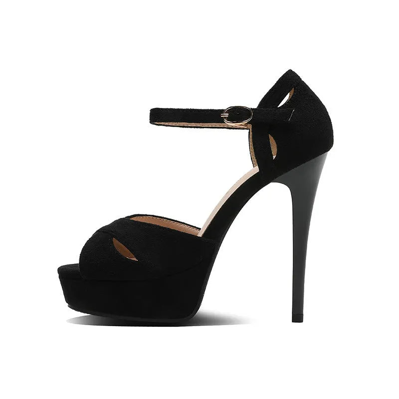 Black women's stiletto sandals with fish mouth toe, Roman style platform, and low heel.