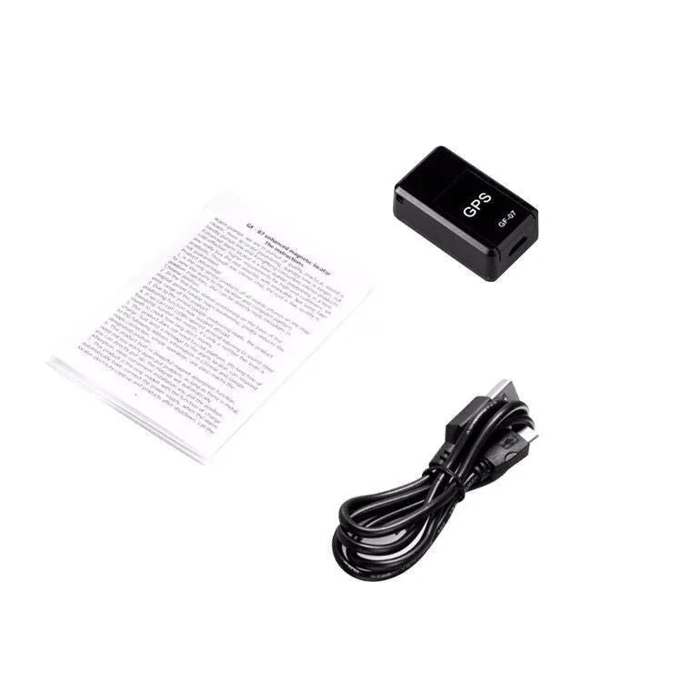 Black mini GPS car tracker device with magnetic mount for vehicle tracking