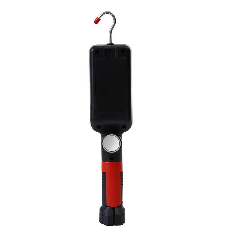 Red portable COB flashlight with magnetic hook showing USB charging port