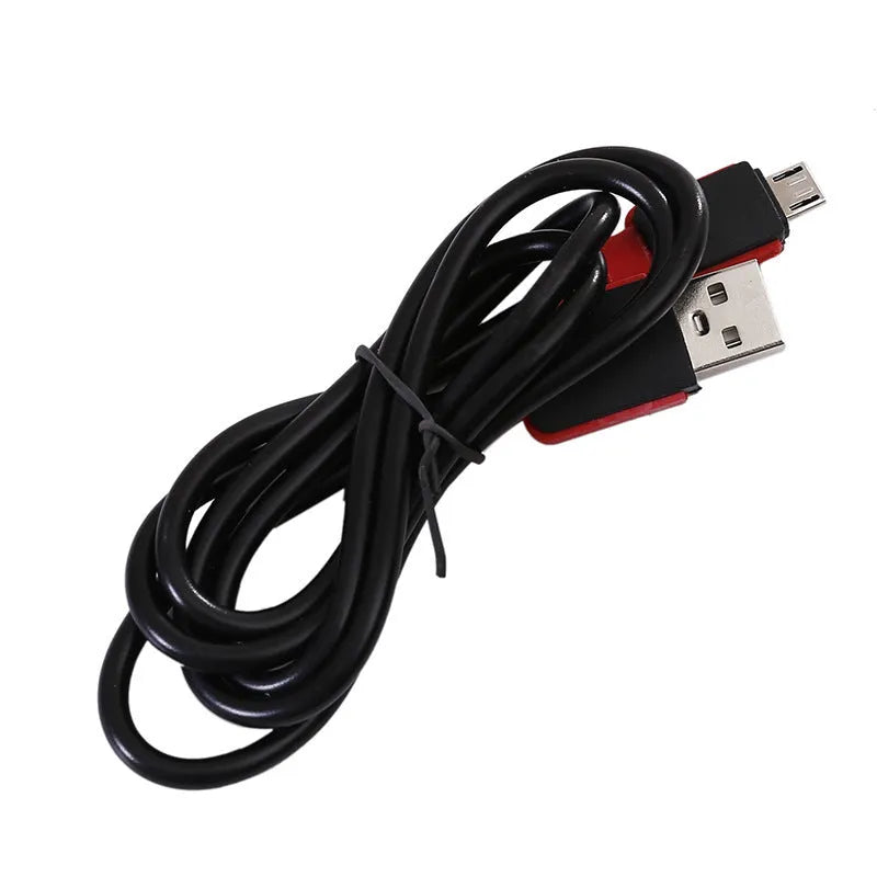 Red portable COB flashlight with magnetic hook showing USB charging port