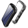 Solar power bank 26800mAh with orange rugged shell and integrated camping light, showing USB ports and solar panel