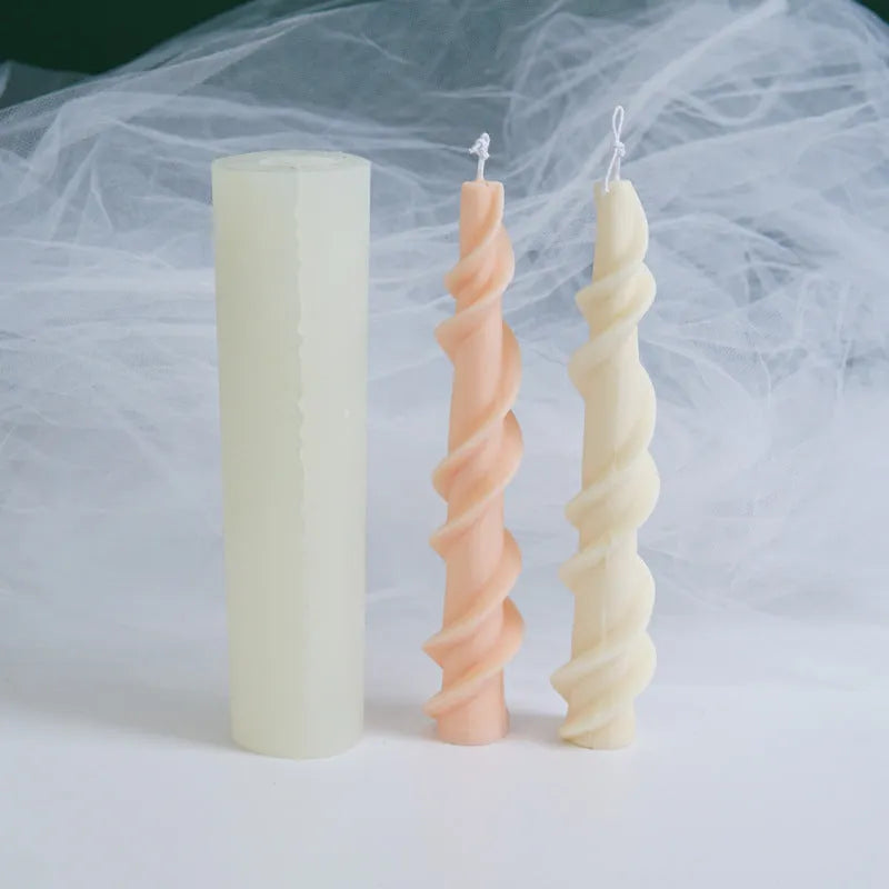 Spiral lace silicone candle mould for creating decorative taper candles with rotating pattern design