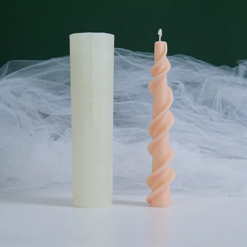 Spiral lace silicone candle mould for creating decorative taper candles with rotating pattern design