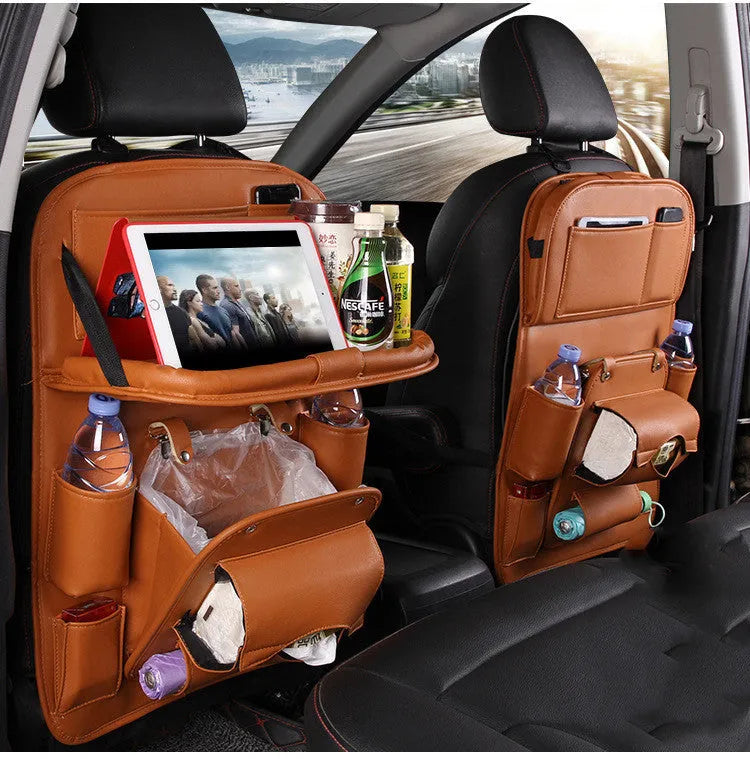 PU leather car storage hanging bag with multiple pockets attached to car seat back