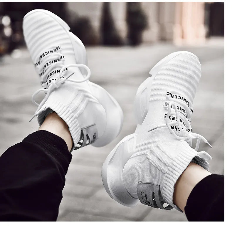 Men's black and white casual sports shoes showing mesh lining and large size options.