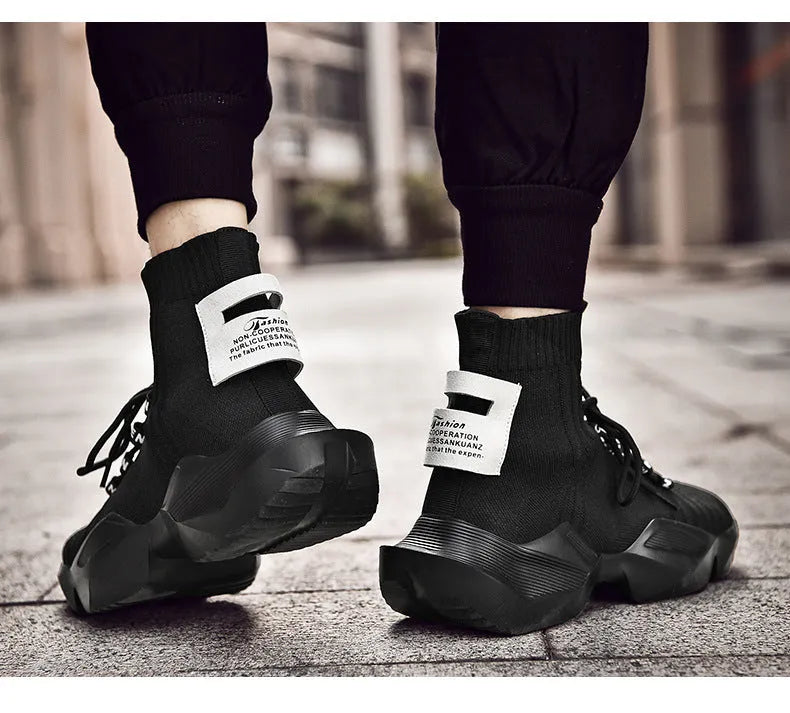 Men's black and white casual sports shoes showing mesh lining and large size options.