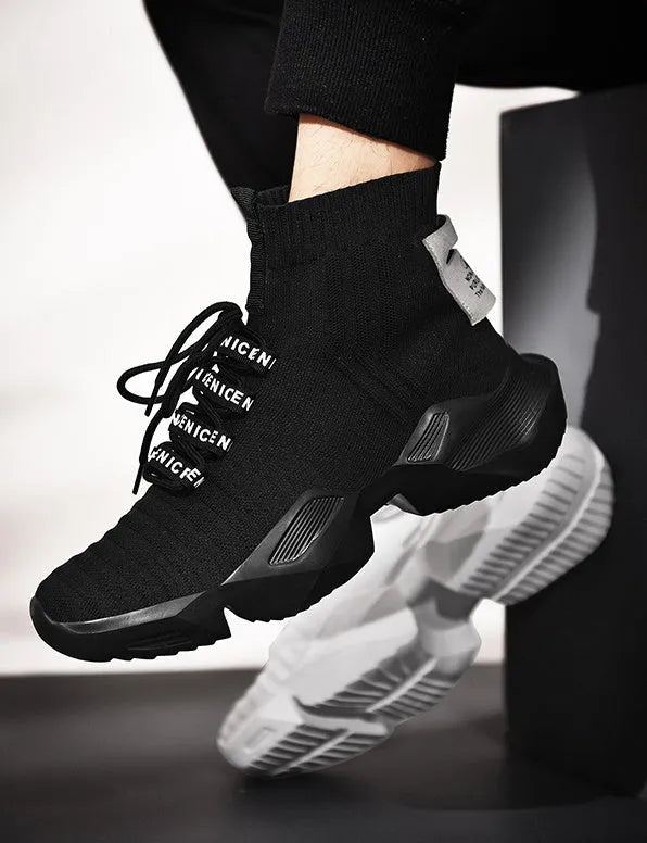 Men's black and white casual sports shoes showing mesh lining and large size options.