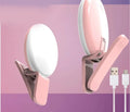 Mini fill light for mobile phone selfie and live streaming in black, blue, pink, and white colours with clip attachment