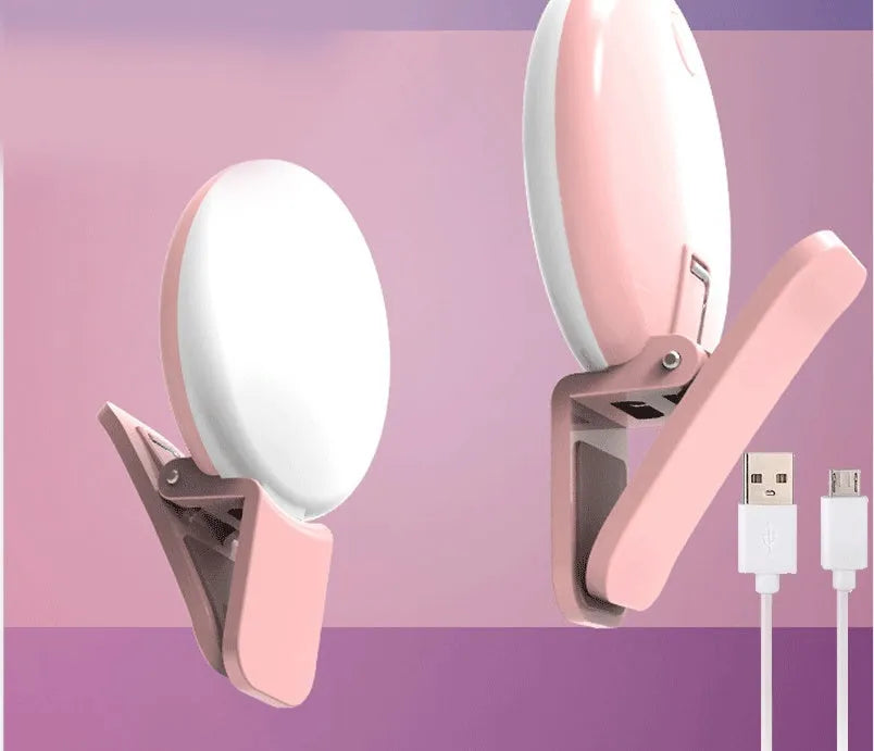 Mini fill light for mobile phone selfie and live streaming in black, blue, pink, and white colours with clip attachment
