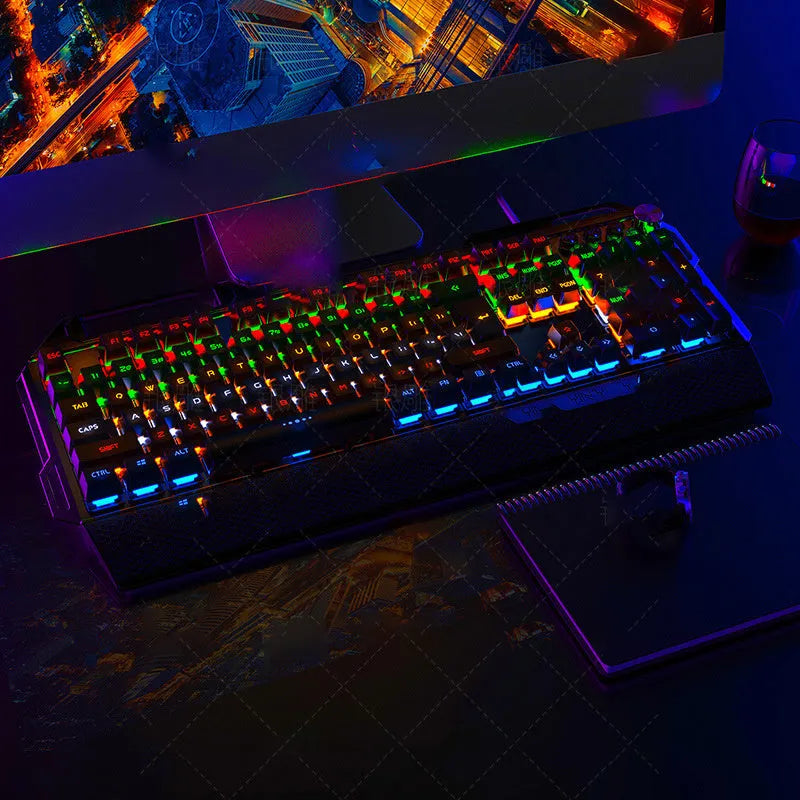 Silver Carving K100 metal mechanical keyboard with black keys and seven-color backlight on a desk