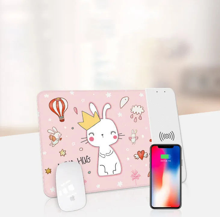 Cartoon design wireless charging mouse pad with RGB lights on a desk