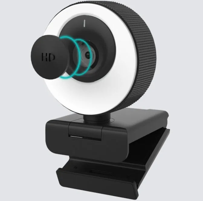 Black USB webcam on a desk with a 1.7m cable, showing a magnetic privacy cover next to the lens.