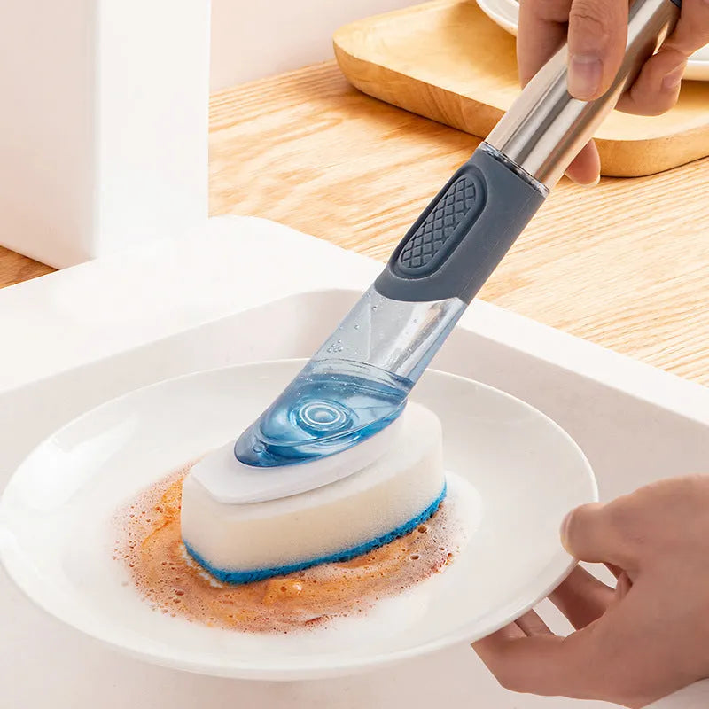 Multifunctional dish brush with soap dispenser, long handle, scouring block and sponge, in blue colour on a kitchen counter