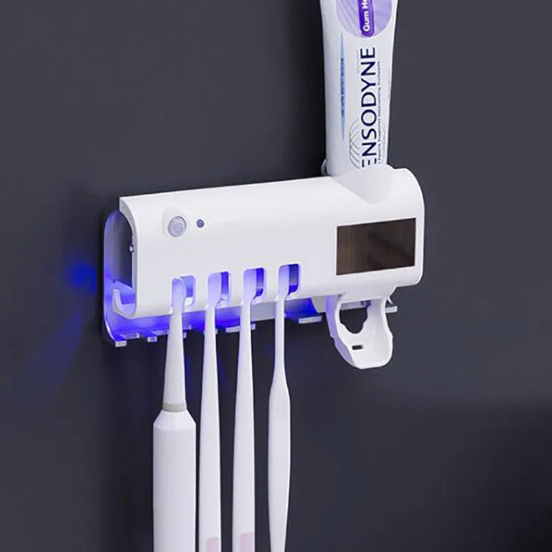 Intelligent UV toothbrush sterilizer with automatic toothpaste squeezer in black, wall-mounted