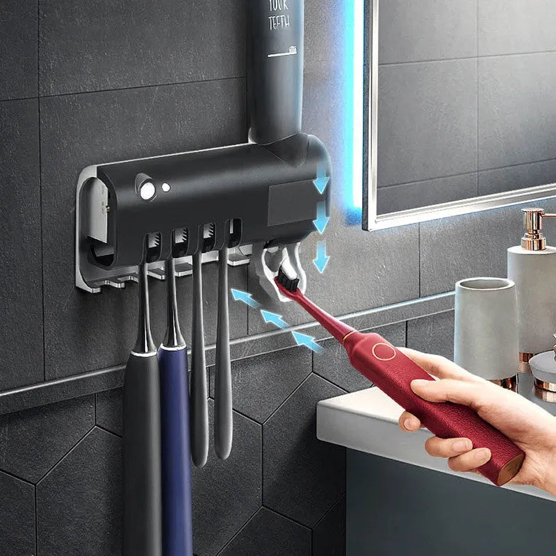 Intelligent UV toothbrush sterilizer with automatic toothpaste squeezer in black, wall-mounted