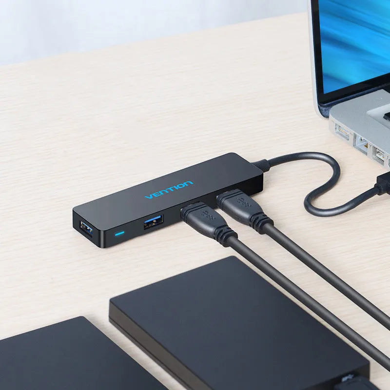 Black four-port USB 3.0 hub with 0.15 metre cable and nickel-plated interfaces