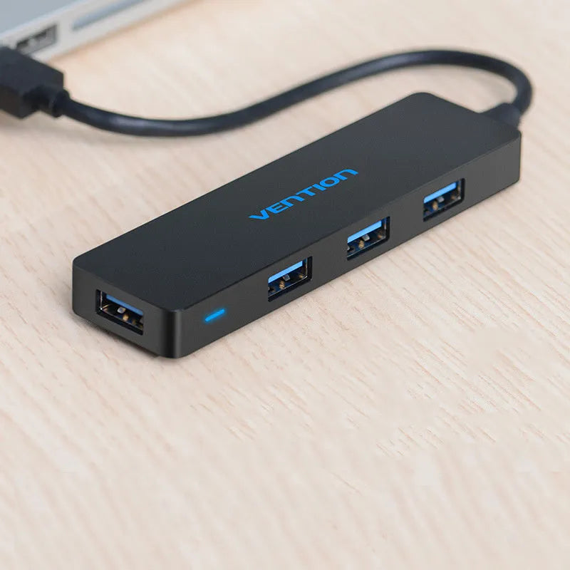 Black four-port USB 3.0 hub with 0.15 metre cable and nickel-plated interfaces