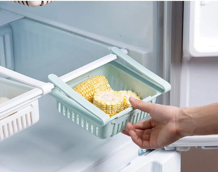 Plastic telescopic storage basket in white for refrigerator drawer organisation