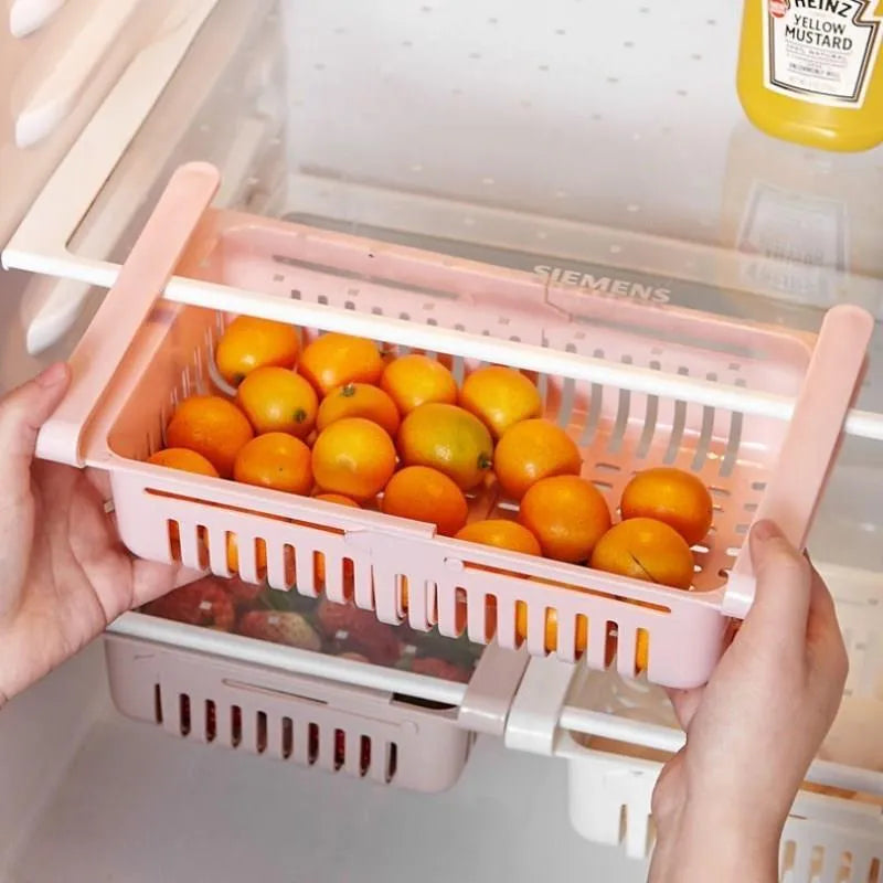 Plastic telescopic storage basket in white for refrigerator drawer organisation