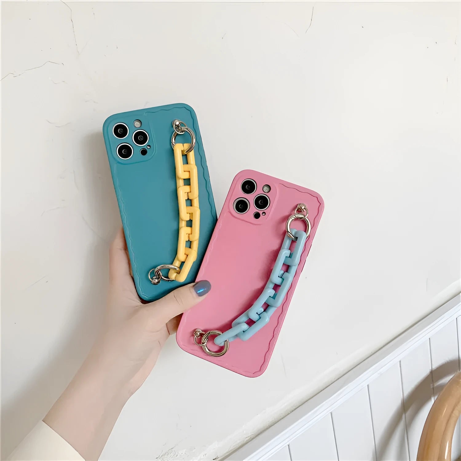 Huawei phone case with photo frame back and candy-coloured chain bracelet strap in pink and light blue