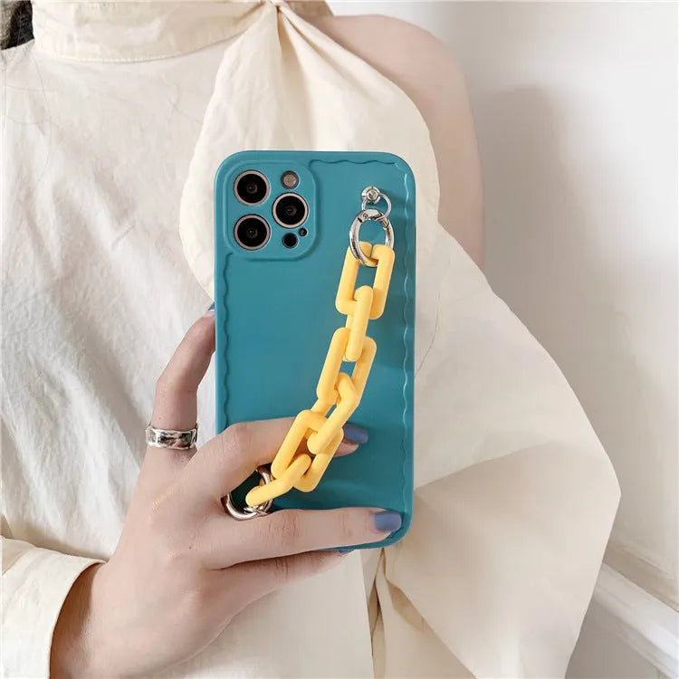 Huawei phone case with photo frame back and candy-coloured chain bracelet strap in pink and light blue