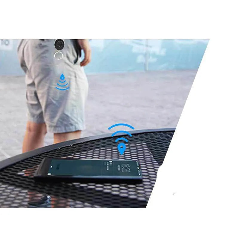Black smart Bluetooth anti-lost device with selfie function, keychain design, compatible with Apple iPhone
