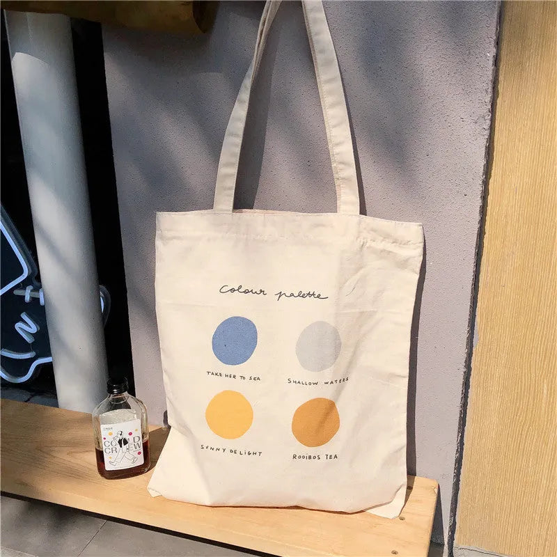 Women's geometric pattern canvas tote shopper bag in light pink and orange colours with zippered opening