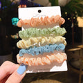 Children's hairpin set with autumn colours showing small intestine rings and large intestine ropes