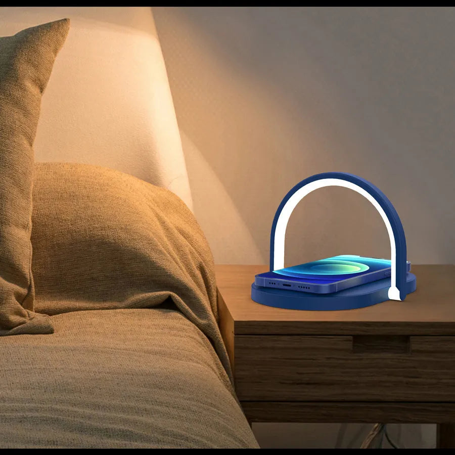 15W wireless charger with night light and phone holder in black on a desk