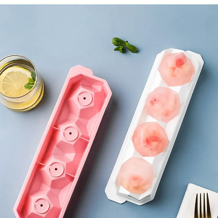 Silicone ice mould tray with hockey puck and geometric ice cube designs in multiple colours