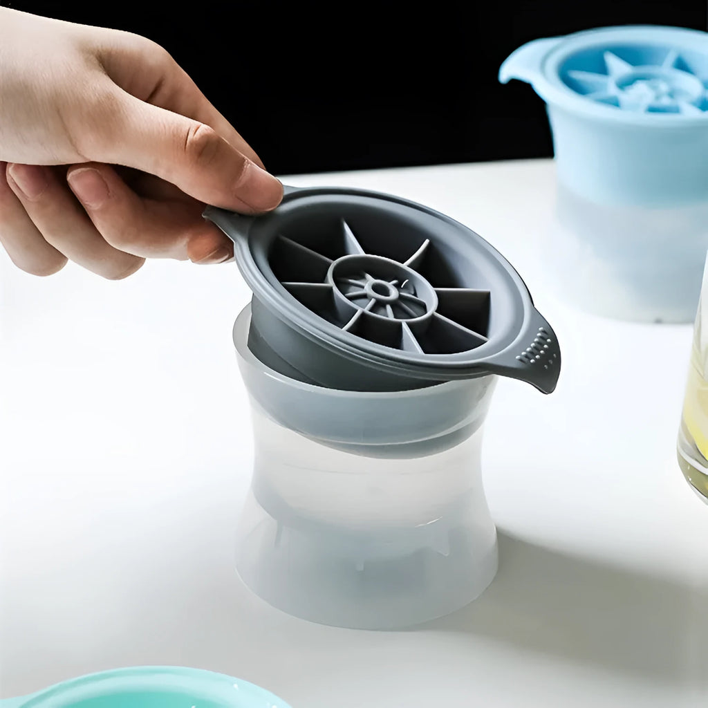 Silicone ice mould tray with hockey puck and geometric ice cube designs in multiple colours