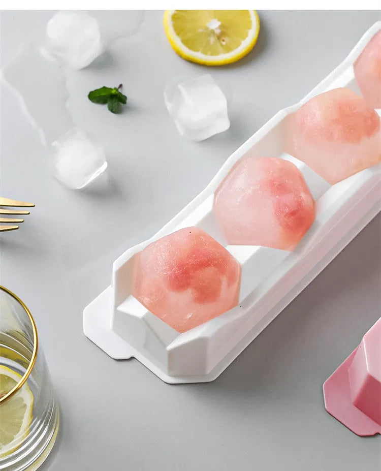 Silicone ice mould tray with hockey puck and geometric ice cube designs in multiple colours