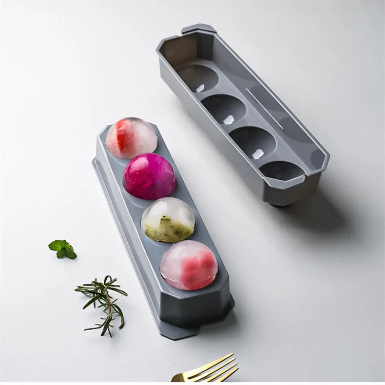 Silicone ice mould tray with hockey puck and geometric ice cube designs in multiple colours