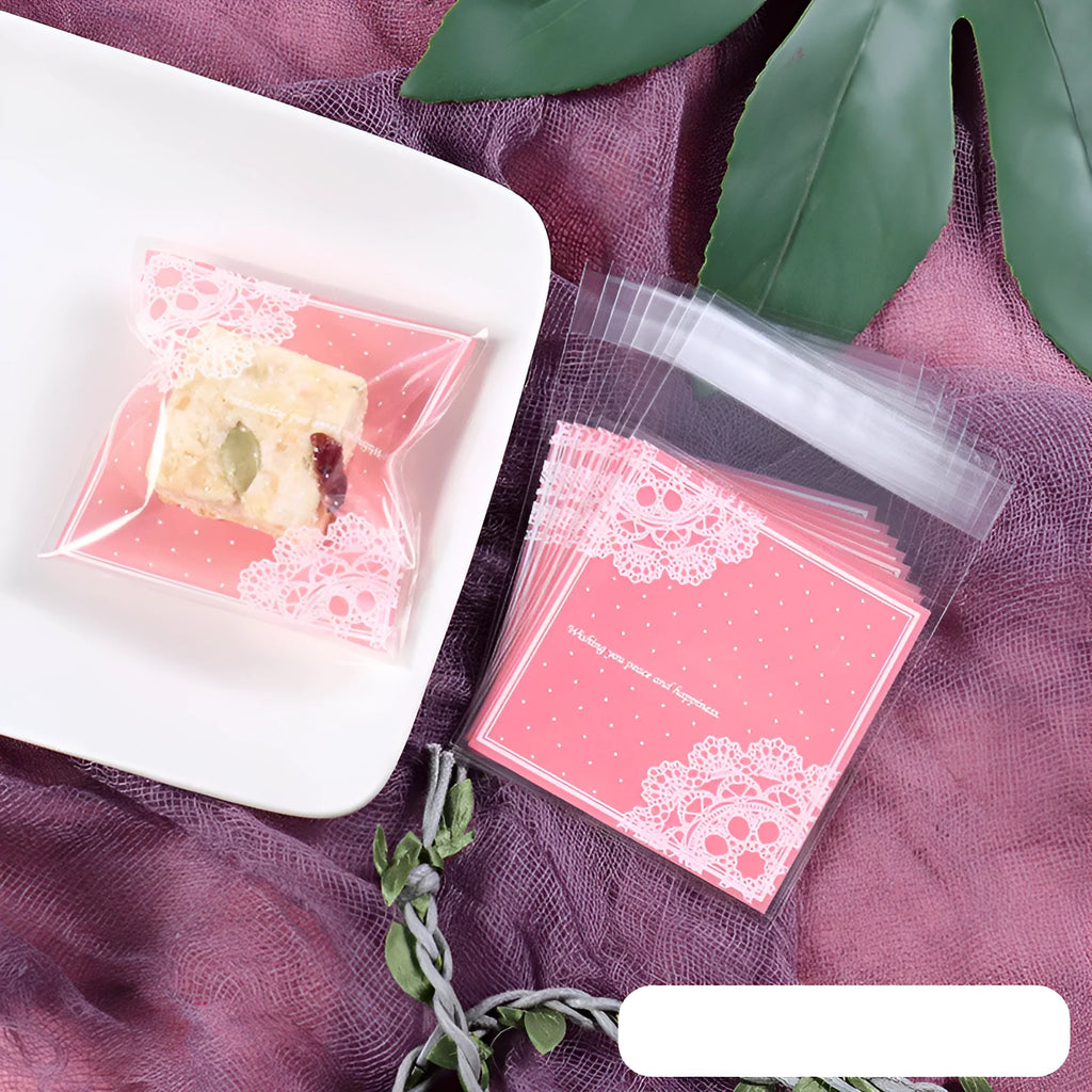 Pink self-adhesive plastic packaging bag with clear window and resealable strip, shown flat and filled.
