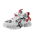Kids blue and red sports sneakers with velcro fastening and rubber soles