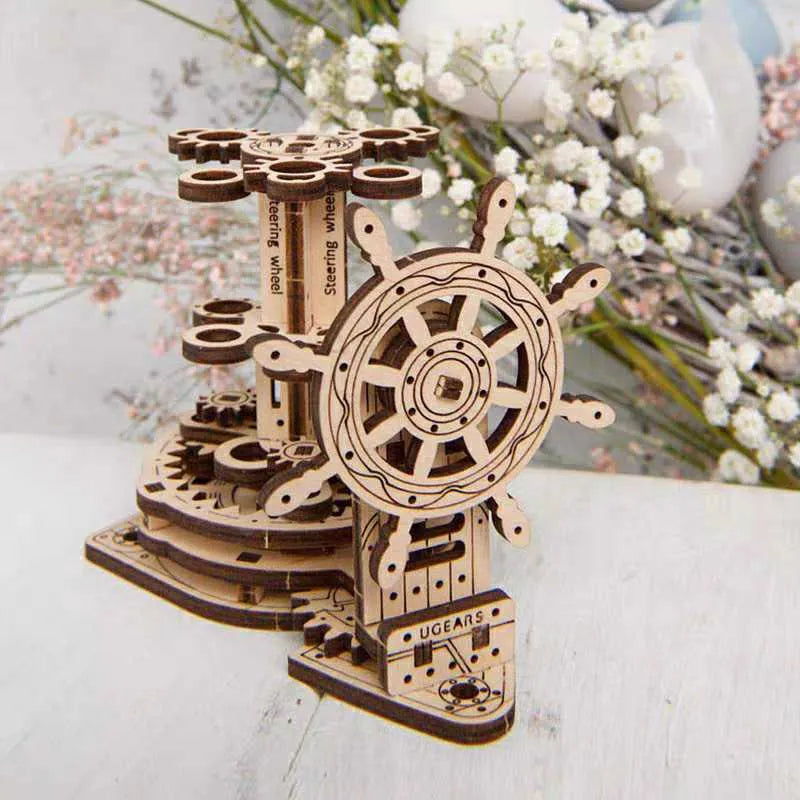 Ukrainian wooden rotating machinery model pen holder on a desk