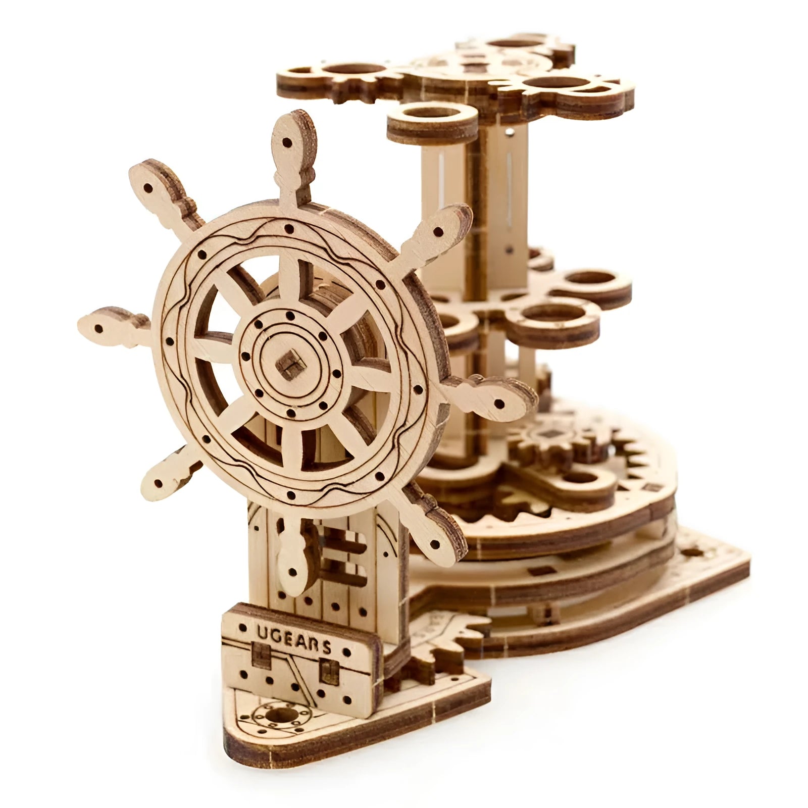Ukrainian wooden rotating machinery model pen holder on a desk