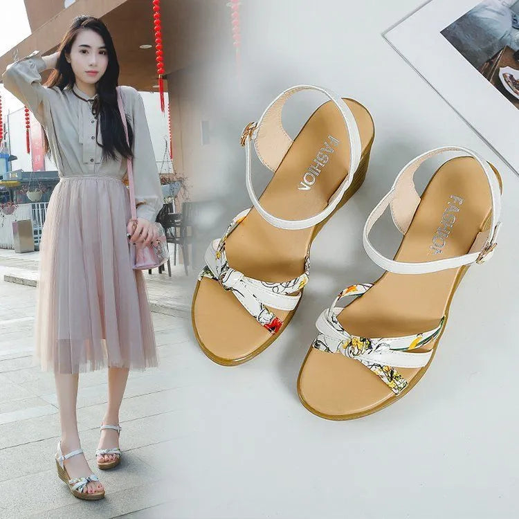 Women's pink wedge sandals with thick heel, fish mouth front, and buckle closure on non-slip sole
