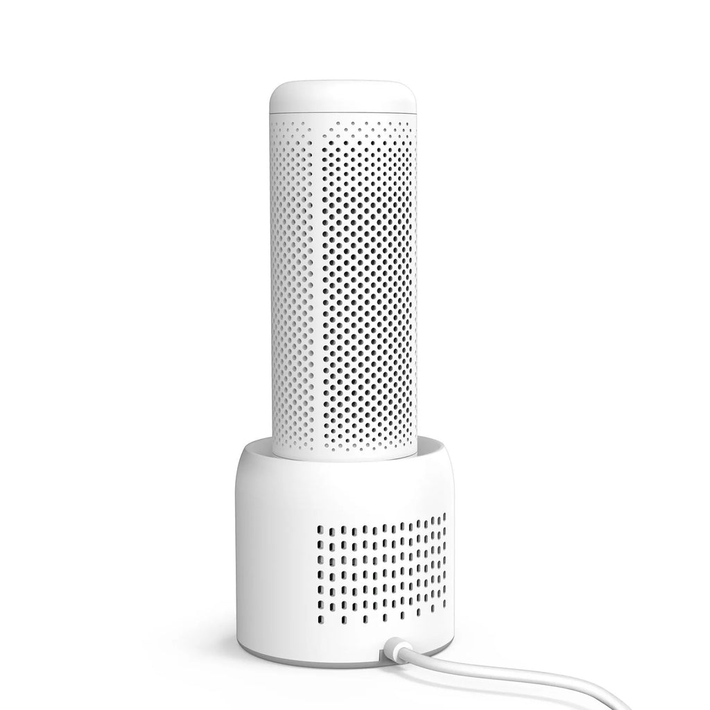 White small indoor dehumidifier for areas up to 10 square metres with 1 litre water tank capacity