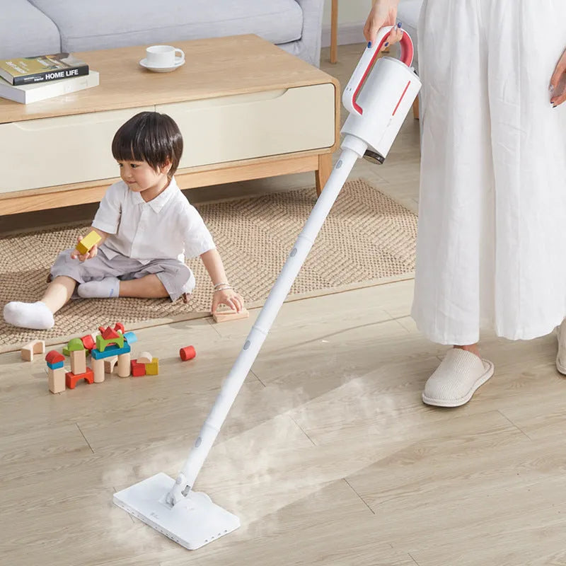Deerma ZQ610 white steam cleaner with five brush heads, glass scraper, and corrugated pipe on a light background